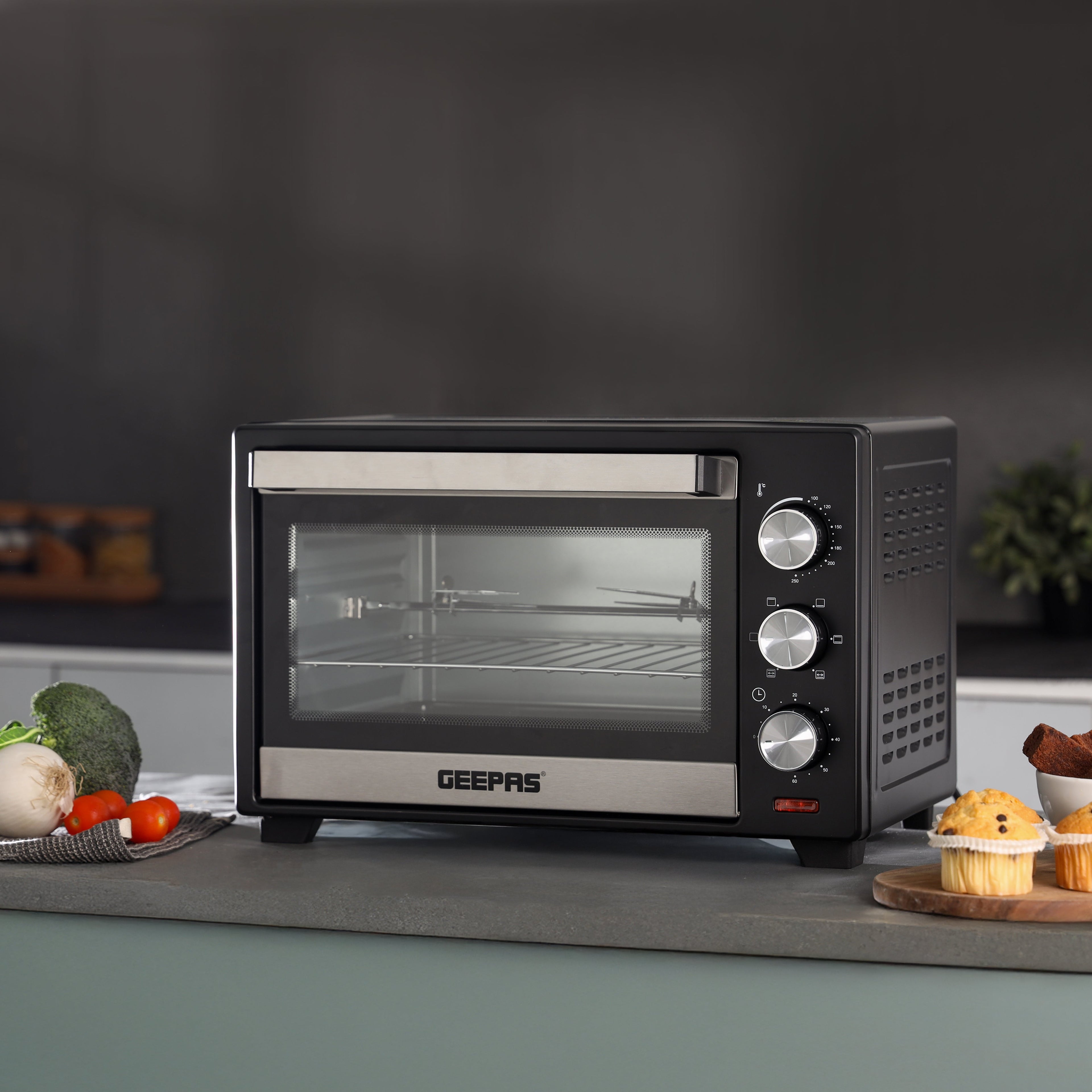Geepas Electric Oven with Rotisserie | 24L Capacity | 1600W Power | Adjustable Temperature Control | 60-Minute Timer | Perfect for Baking, Grilling, and Roasting